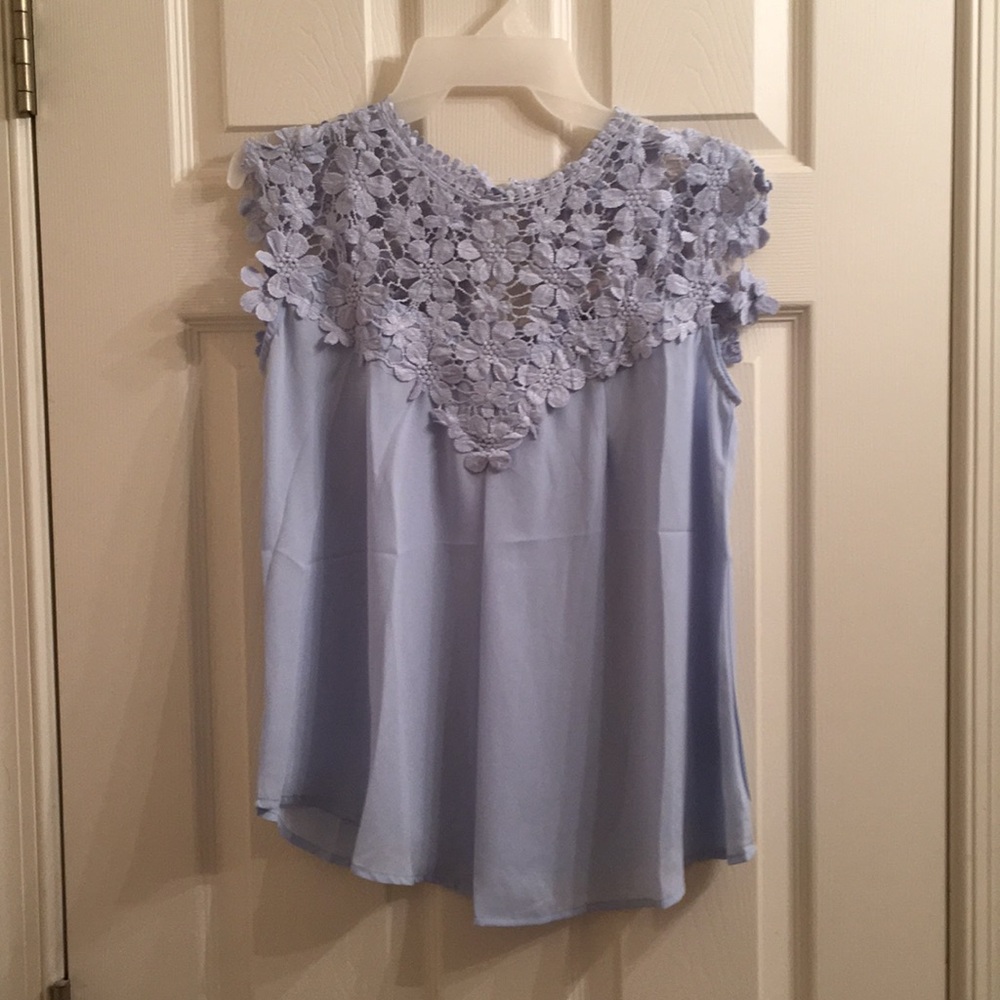 Blue sleeveless blouse